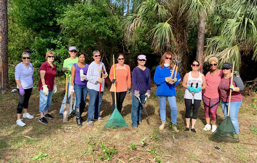 Volunteers working on the Camp Telogia restoration project