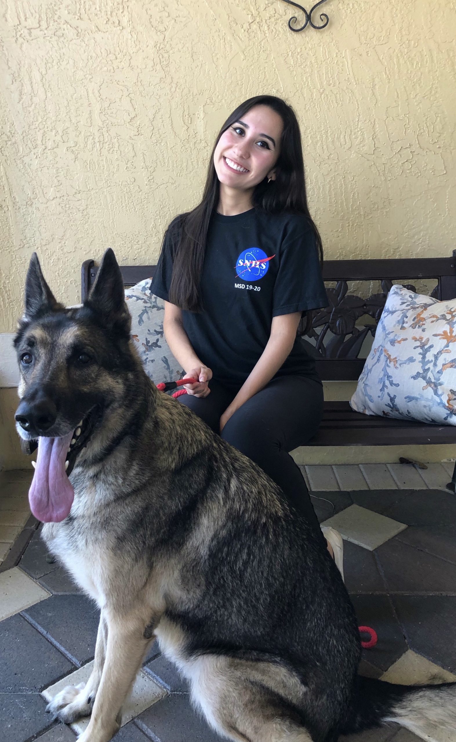 Briana with her current foster, a 6-year-old German Shepard 