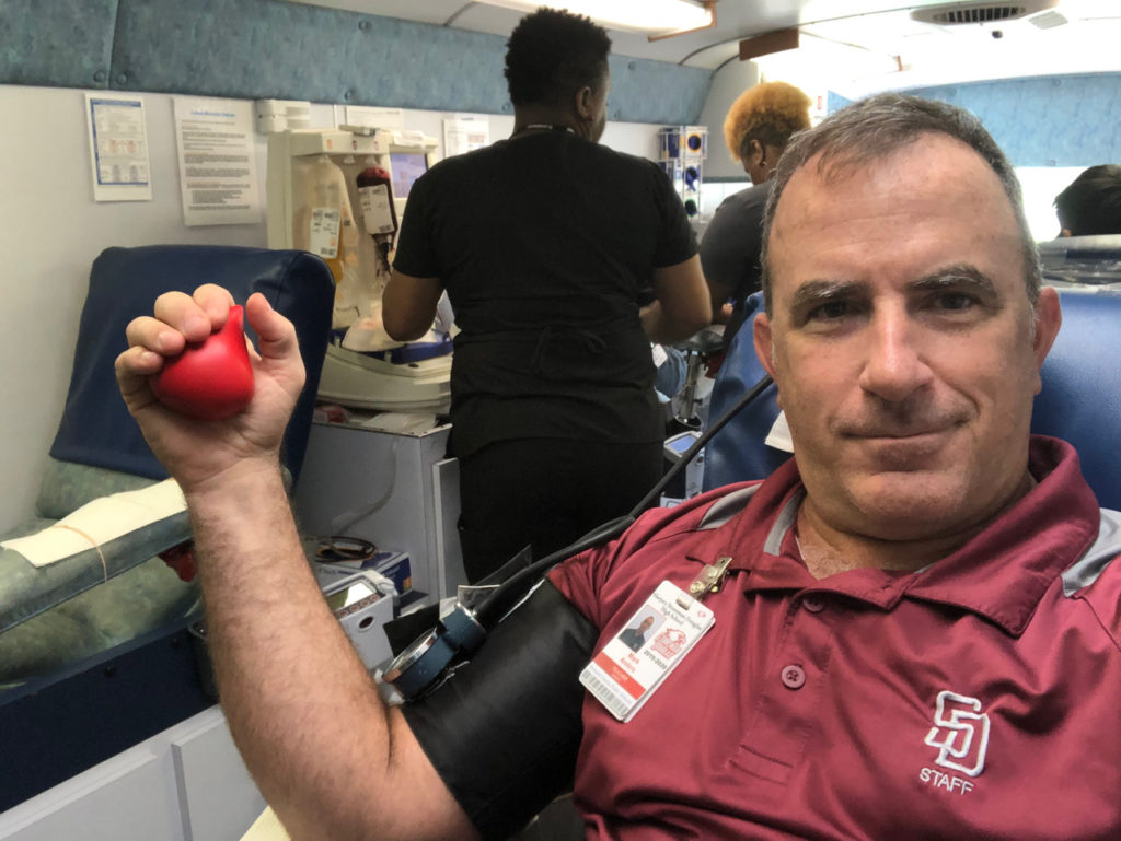 Lieutenant Colonel Mark Anders donating blood