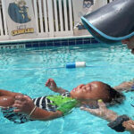 Superhero Swim Academy offers lessons for babies. {courtesy}